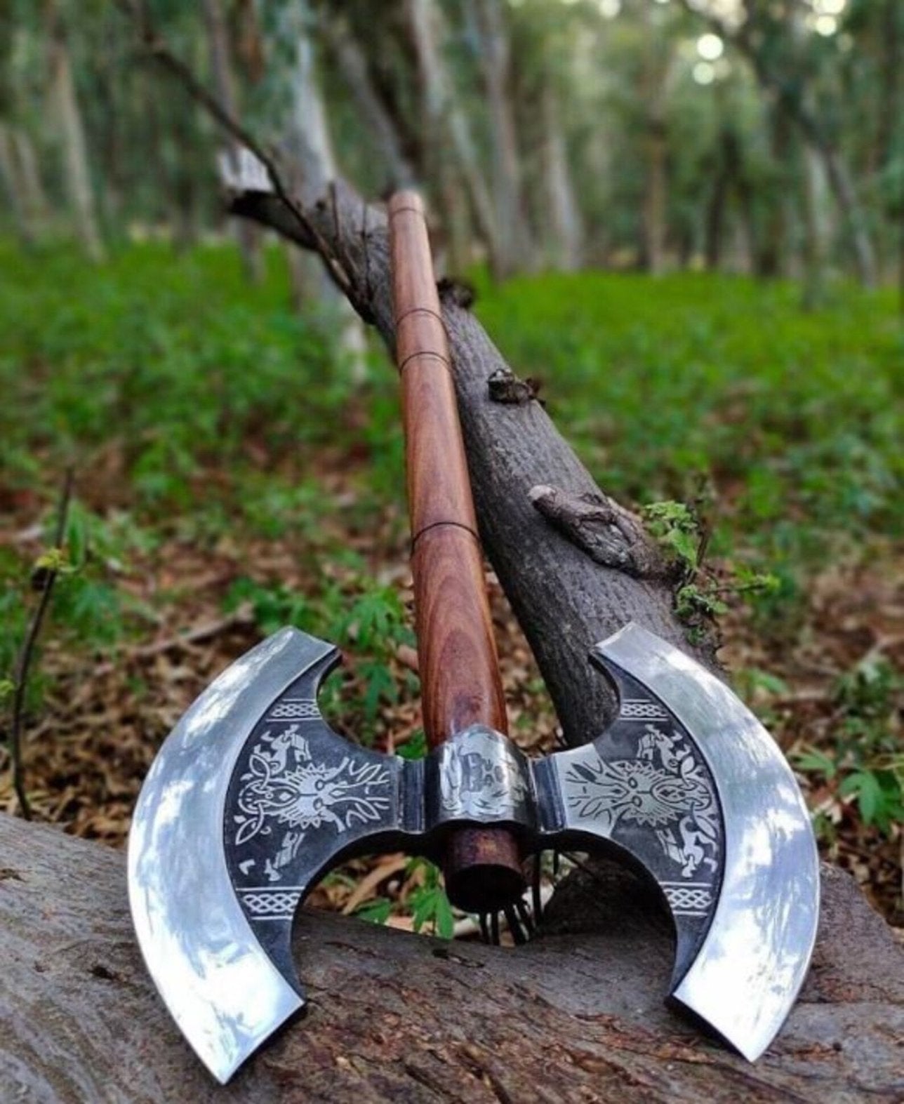 Nordic Yuletide Warrior Axe with custom engravings, crafted from high carbon steel and ash wood, available with an optional wooden box.