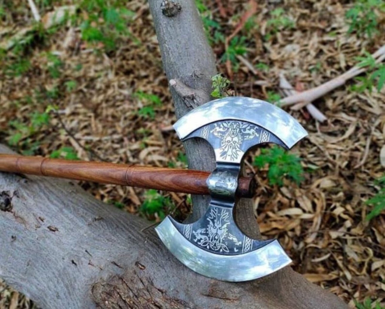 Unique Nordic Warrior Axe with personalized engravings, crafted in high carbon steel and ash wood, available with a wooden box for gifting.