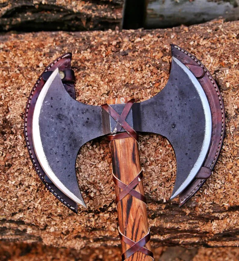 Double Headed Berserker Axe with wooden handle on a wooden background