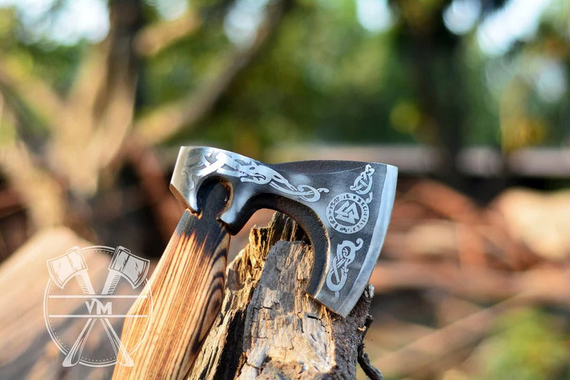 Valknut Viking Axe on a wooden background