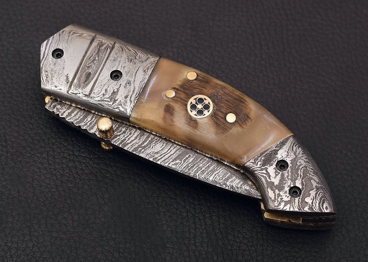 ram handle folding knife, engraved damascus steel, with leather sheath and sharpner