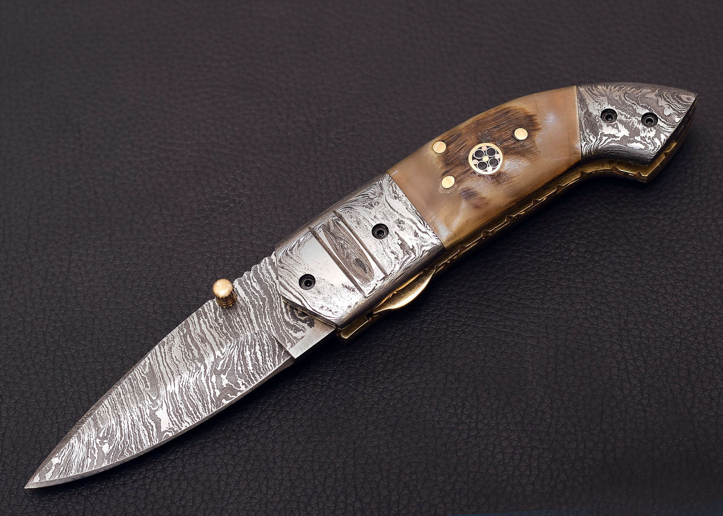 Damascus Steel Folding knife with Ram Handle