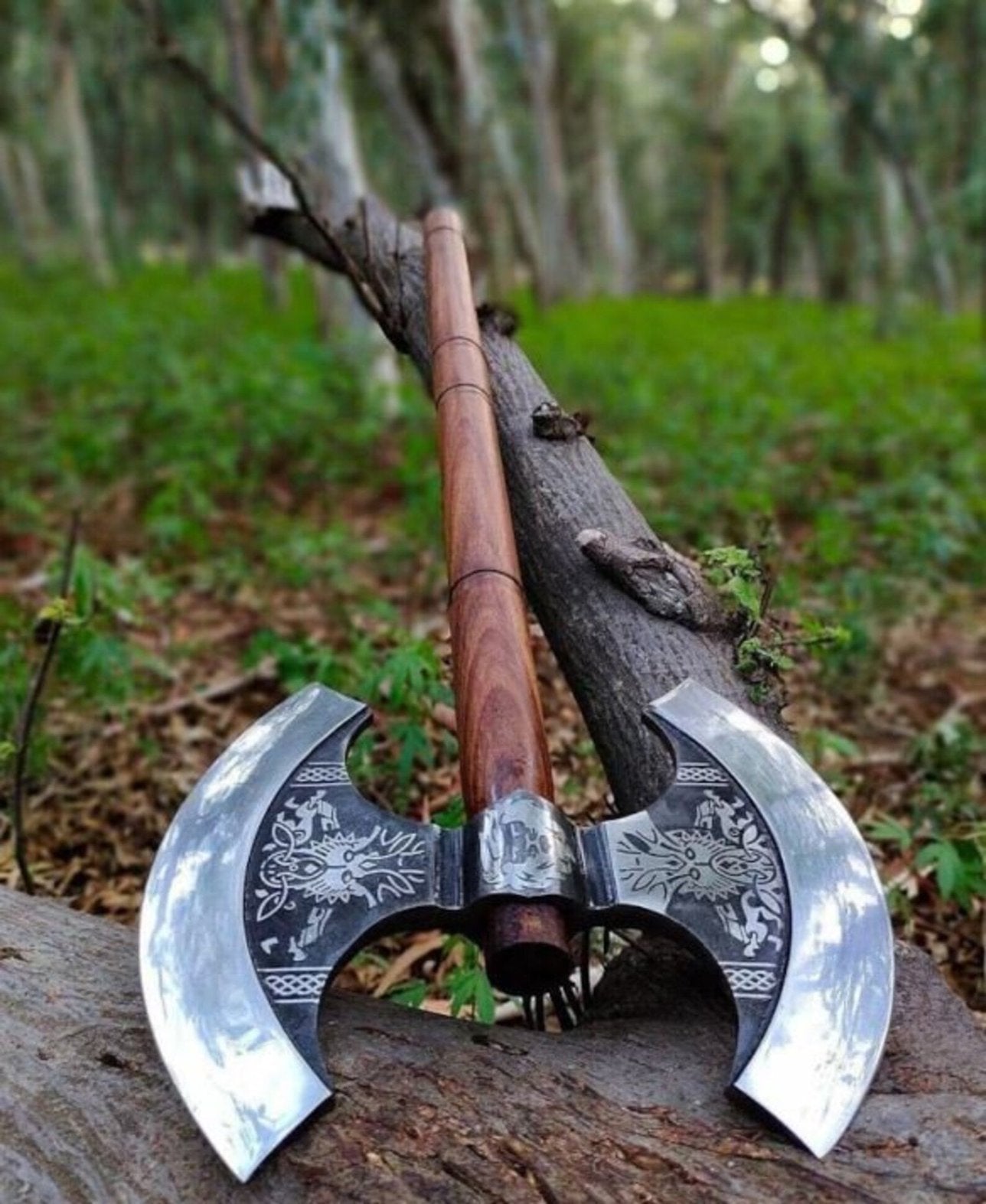 Nordic Yuletide Warrior Axe with custom engravings, crafted from high carbon steel and ash wood, available with an optional wooden box.

