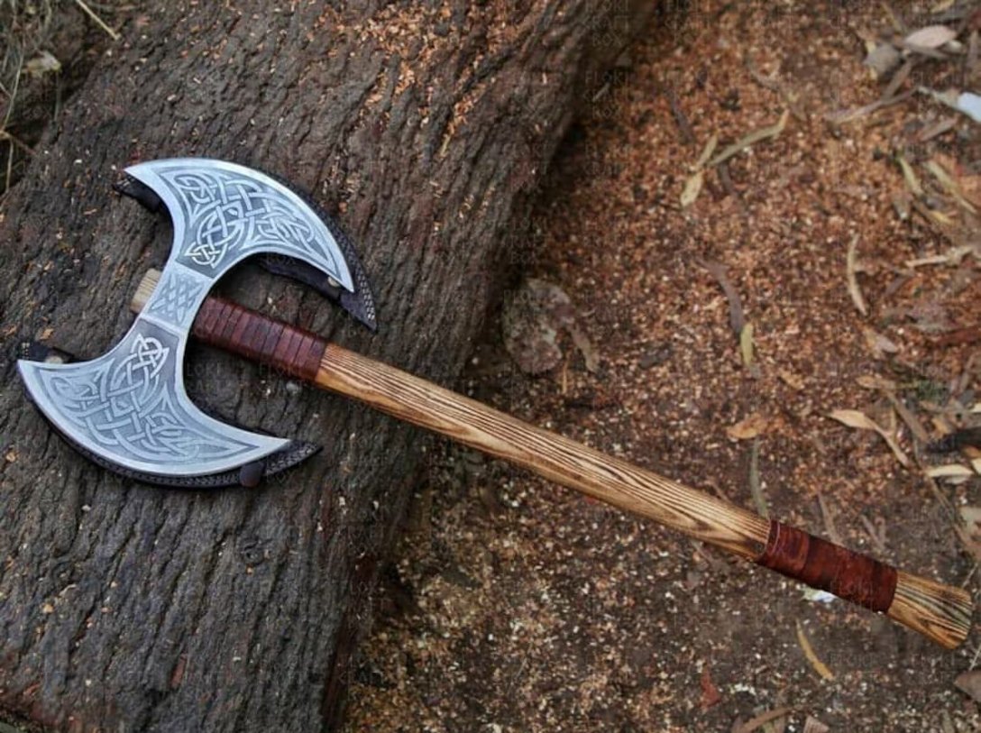 Snowstrike Axe with custom engravings, crafted in high carbon steel with an ash wood handle, available with an optional wooden box for a meaningful gift.

