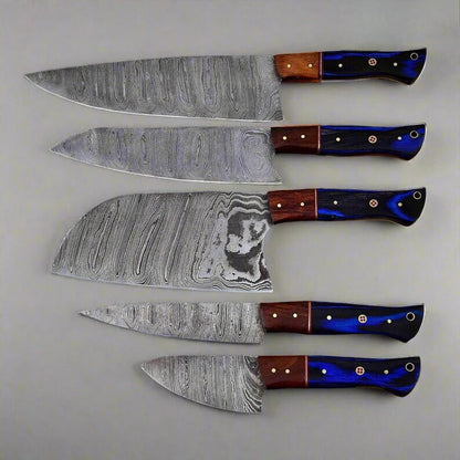 Set of five knives with damascus steel blades and colorful handles on a light gray background