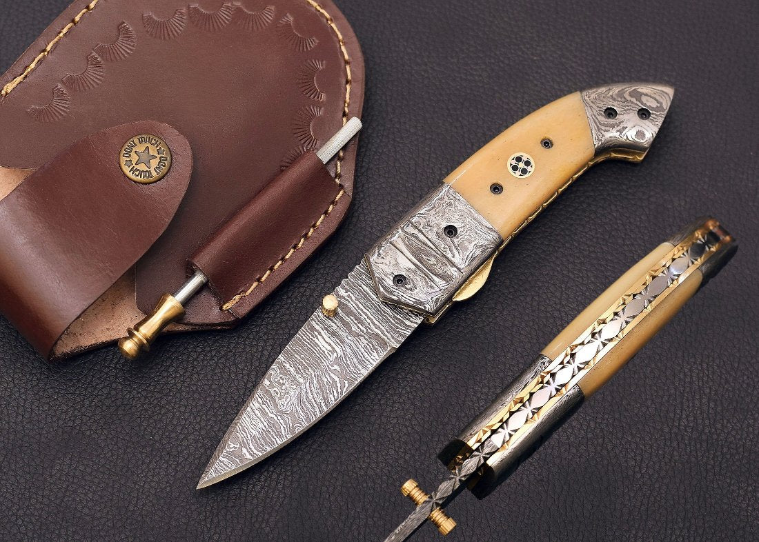 cow bone handle folding knife with leather sheath, sharpener, front and back look