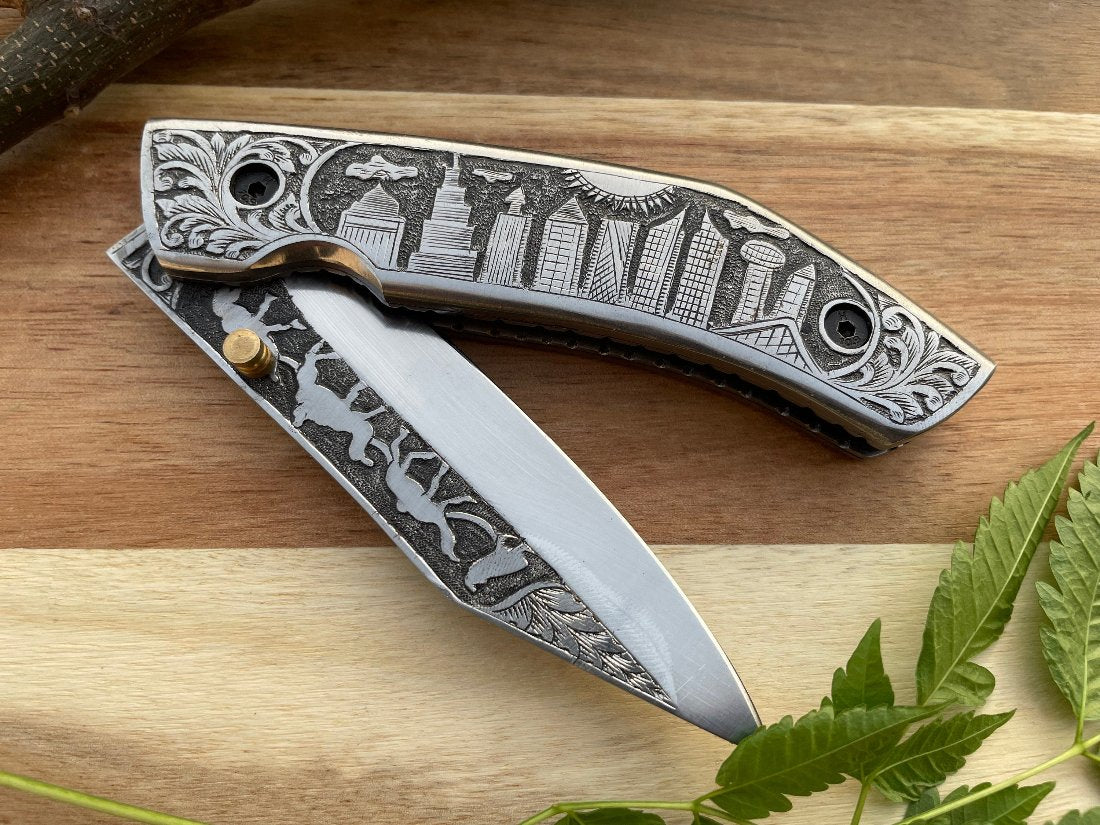 gift silver hunt pocket knife which is hand engraved, making it a very special and thoughtful gift