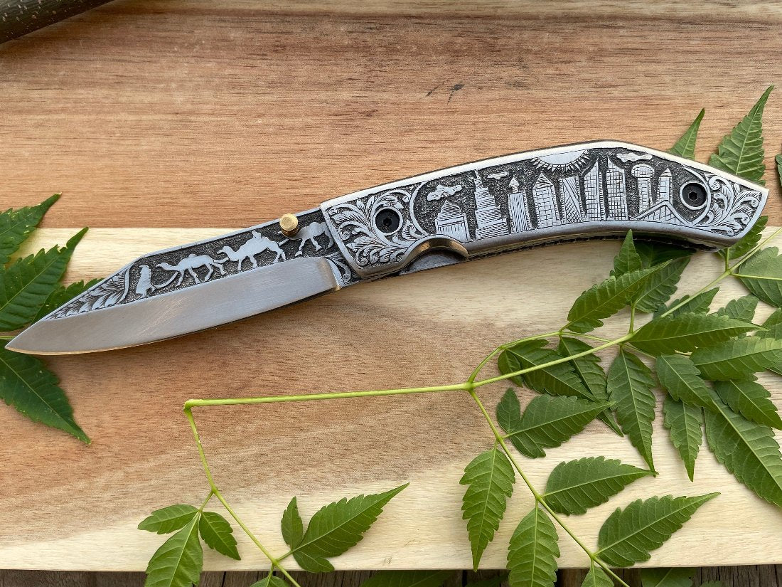 buy silver hunt pocket knife. hand engraved with excellent details