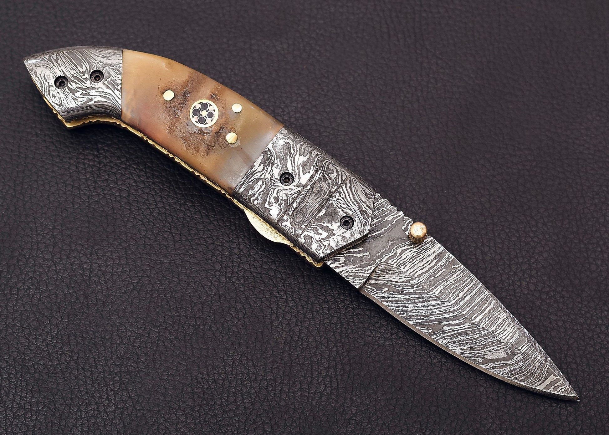 Damascus Steel Folding knife with Ram Handle