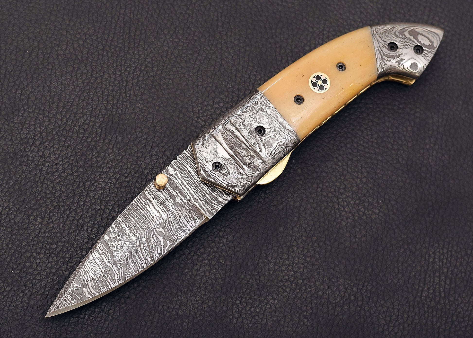 Damascus Steel folding knife with Cow bone handle