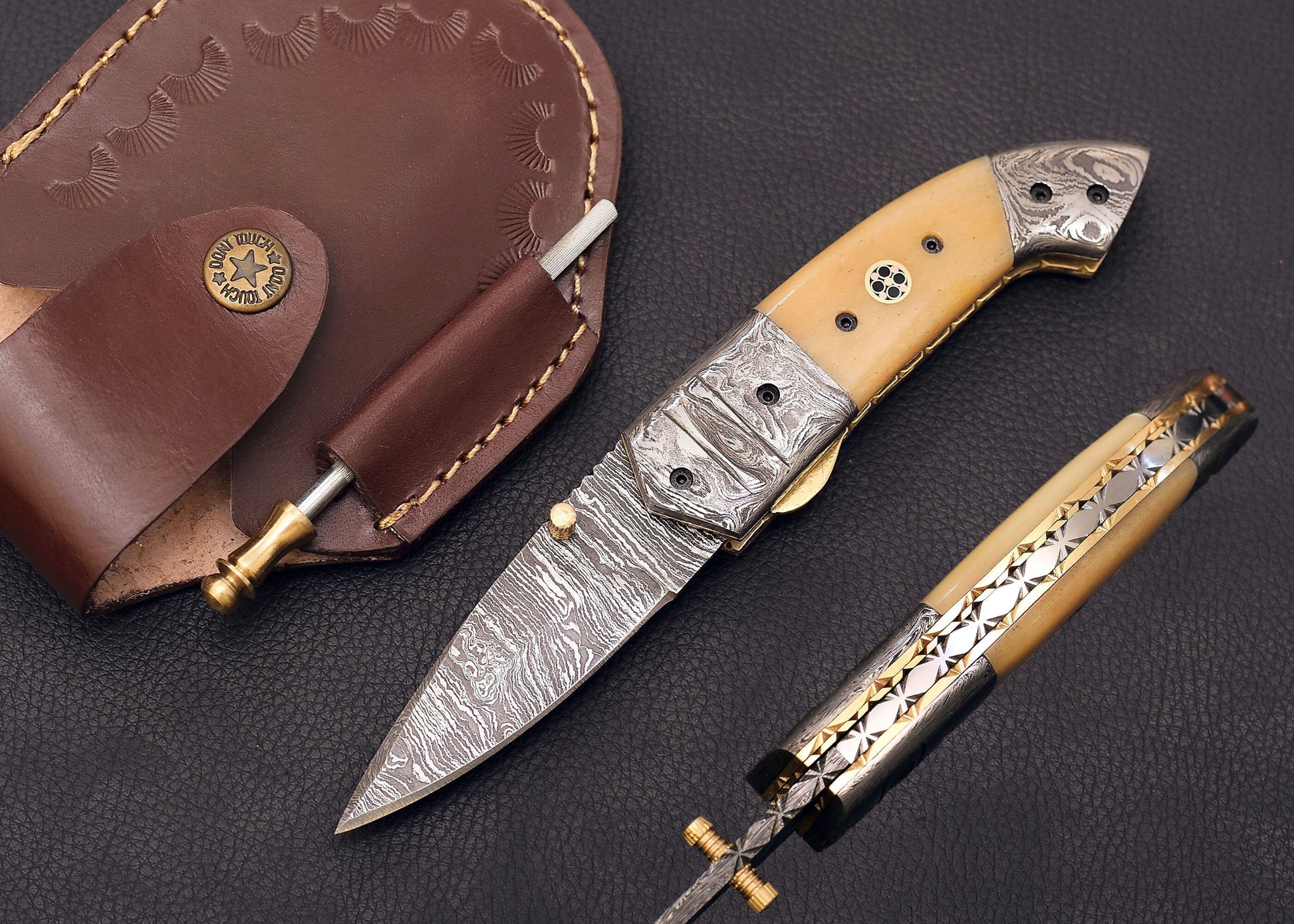 Damascus Steel folding knife with Cow bone handle